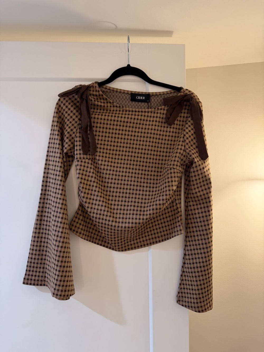 Cider boat neck gingham brown top